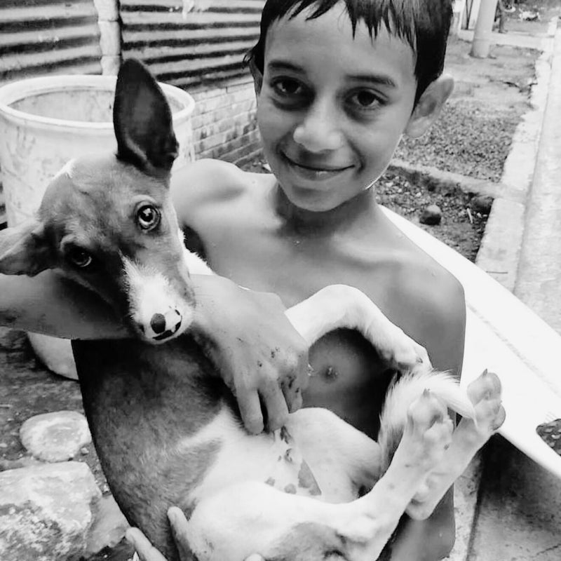 Kid with dog El Salvador